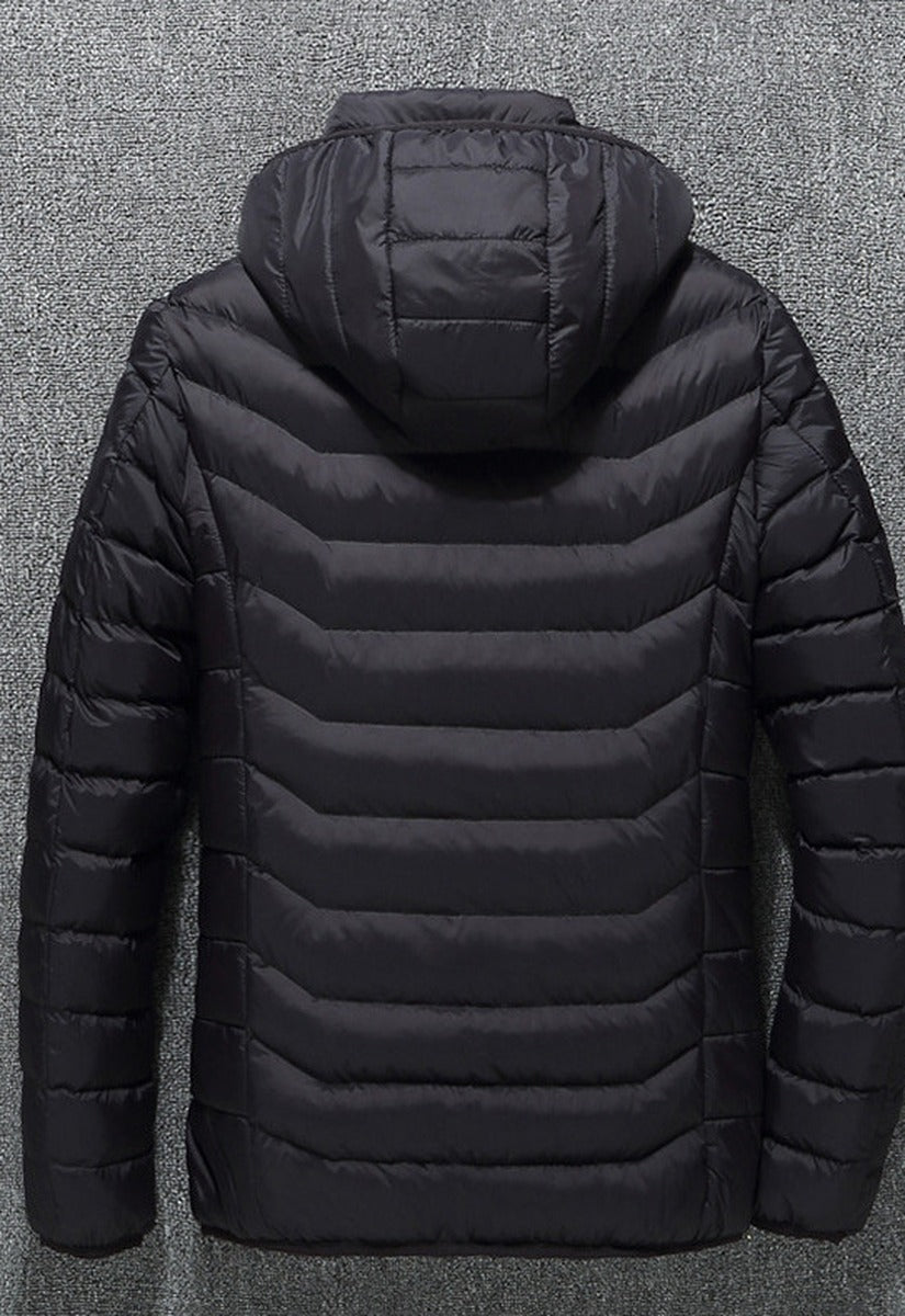 NorthCinch USB heated hooded puffer jacket in black, back view with the hood up